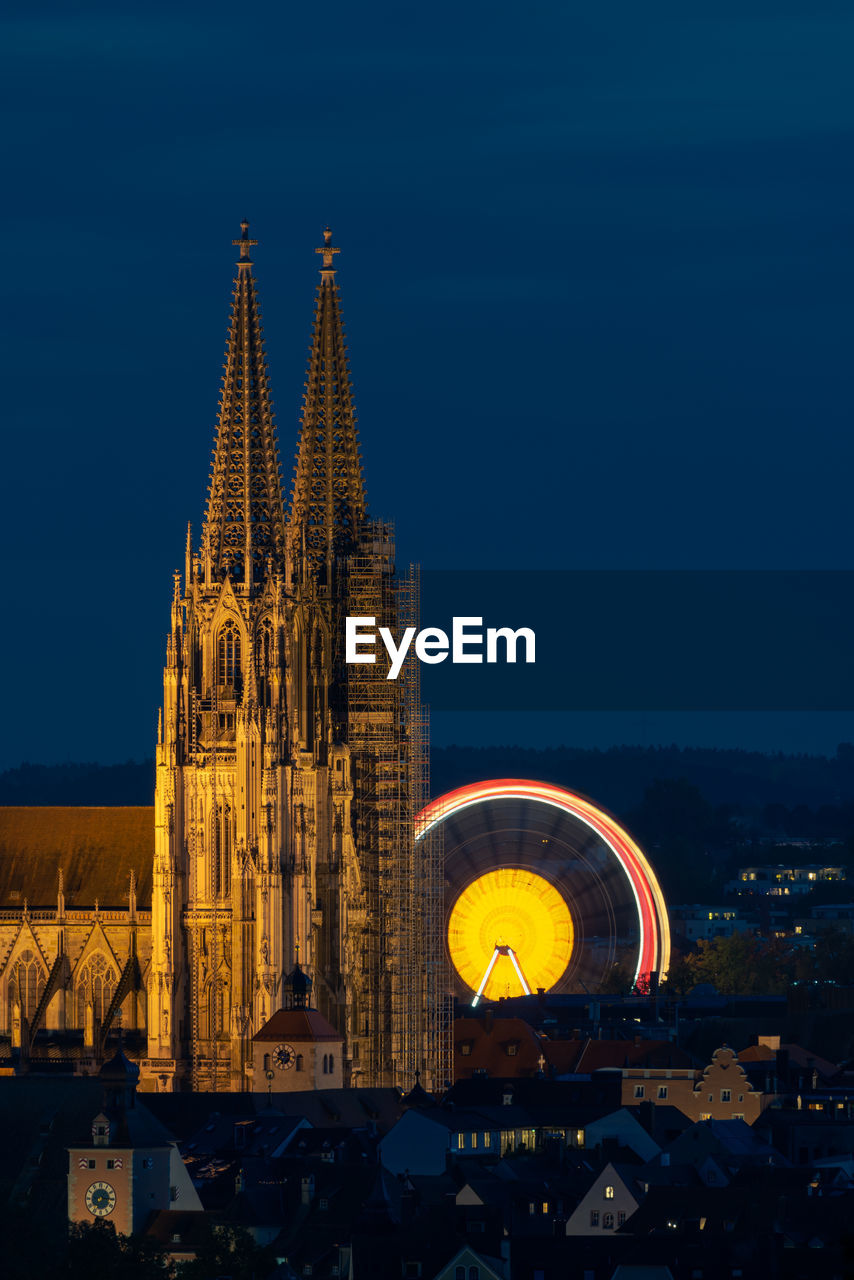 ILLUMINATED BUILDINGS AT NIGHT