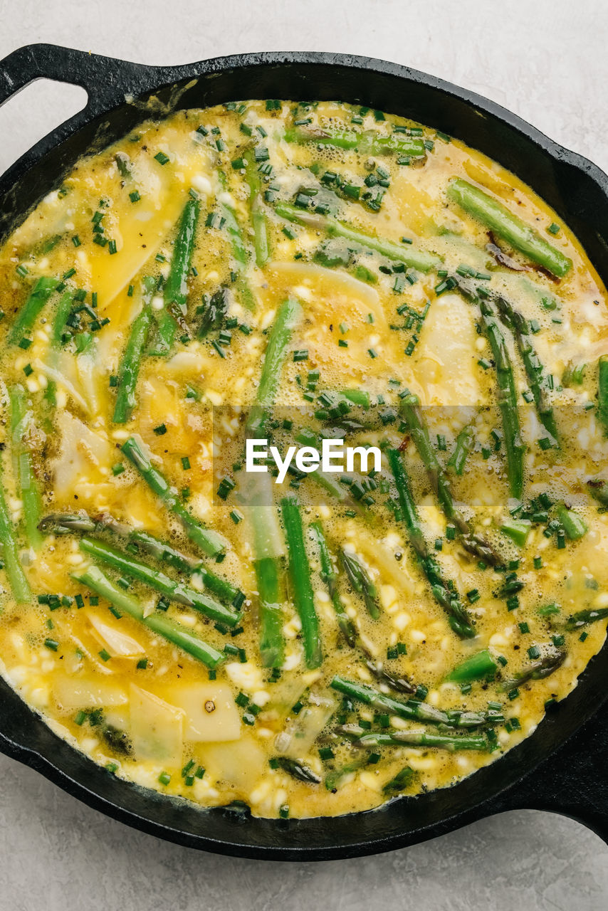 Pre-baked egg and asparagus frittata still life