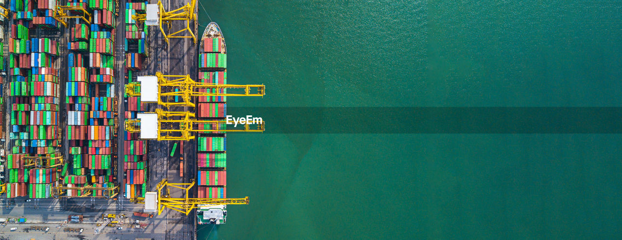 Directly above shot of cargo containers at harbor