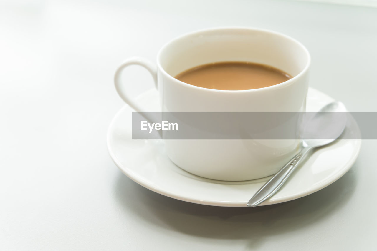 Close-up of tea against white background