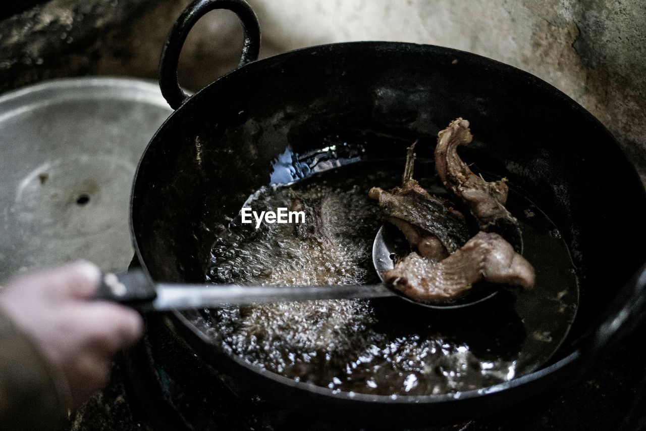 Close-up of person preparing food