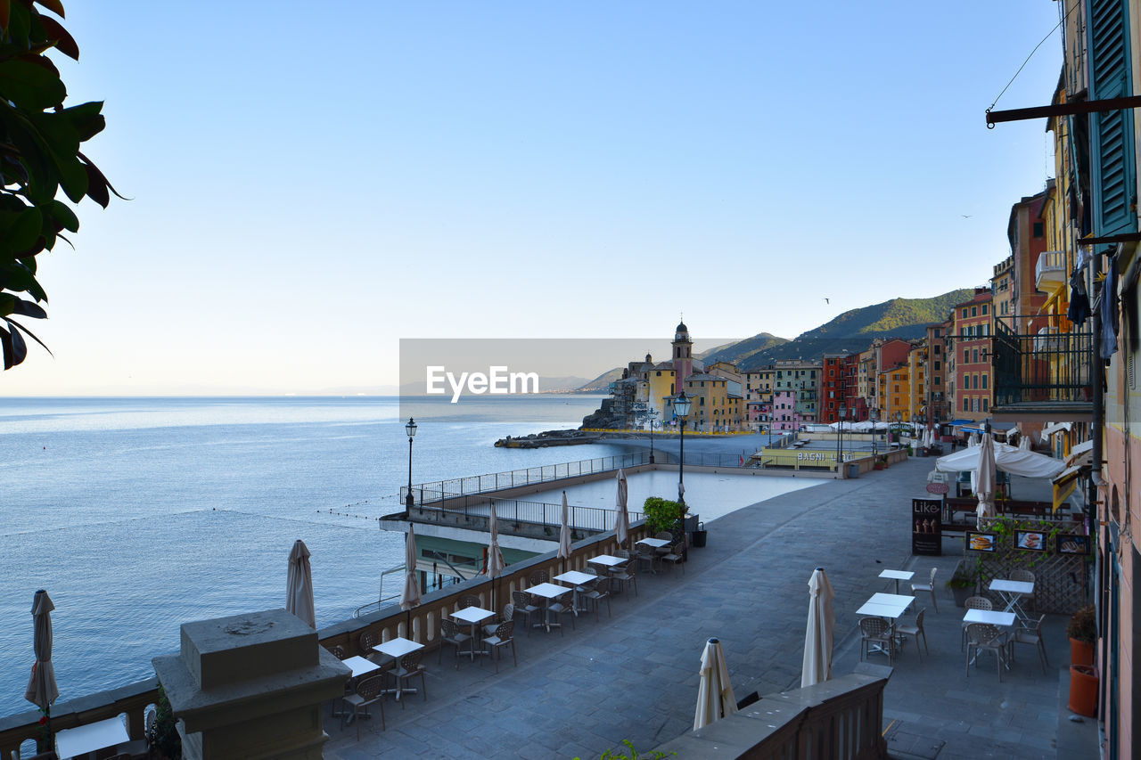 VIEW OF BUILDINGS AGAINST SEA