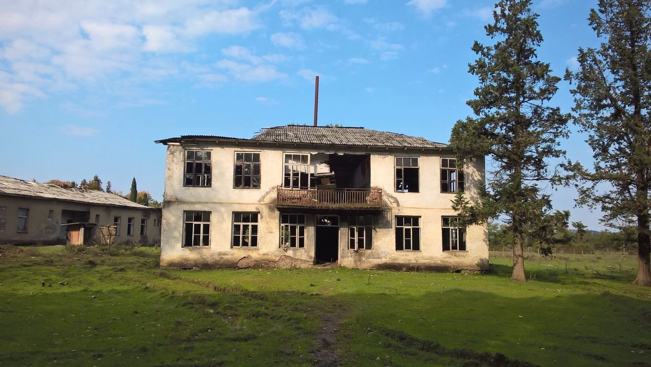 Abandoned house against sky