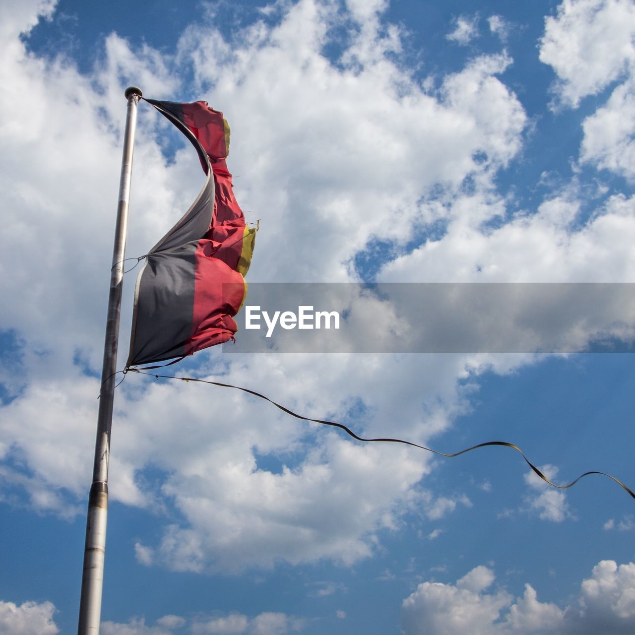 Low angle view of flag in wind