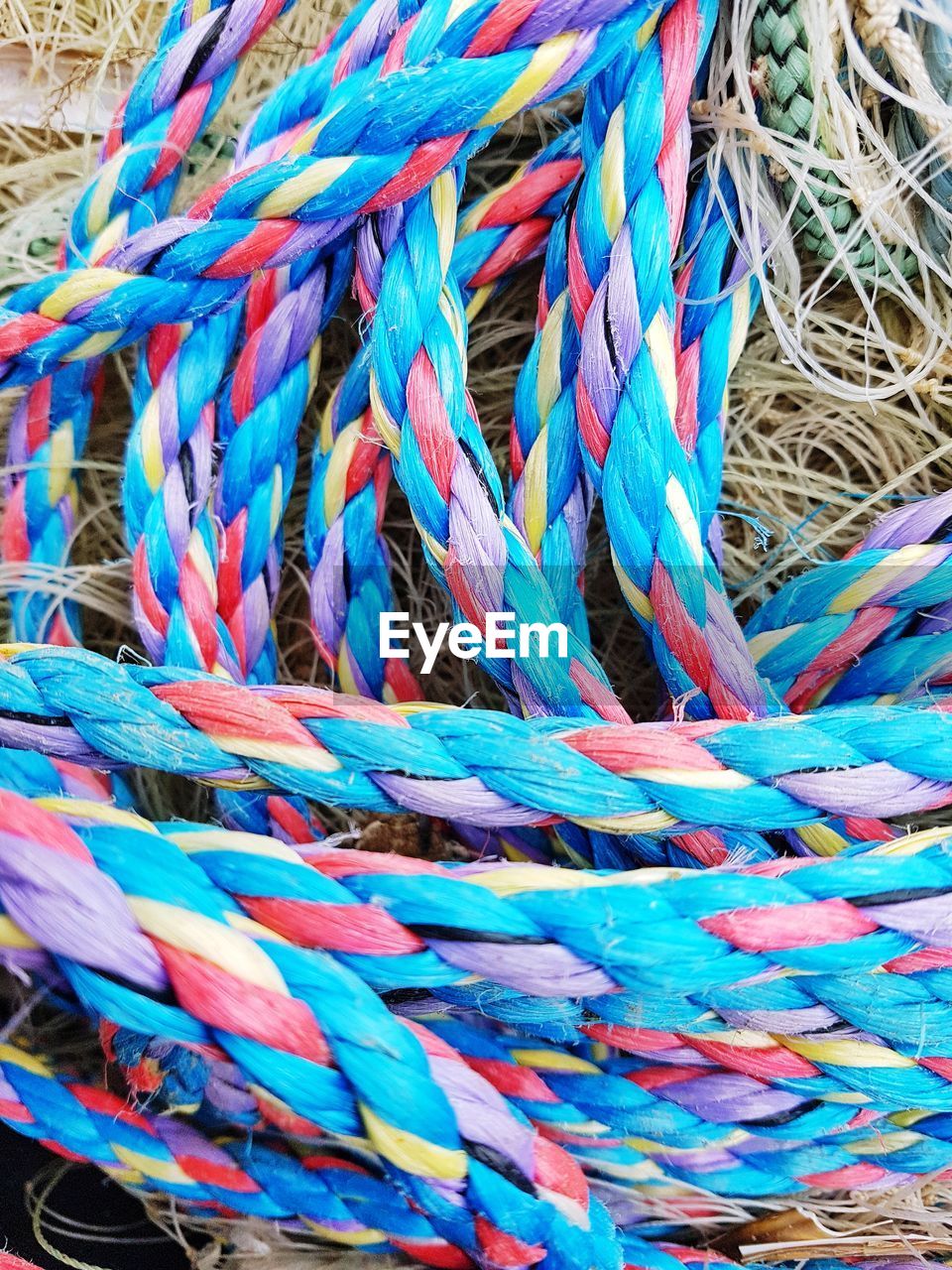 HIGH ANGLE VIEW OF MULTI COLORED ROPES