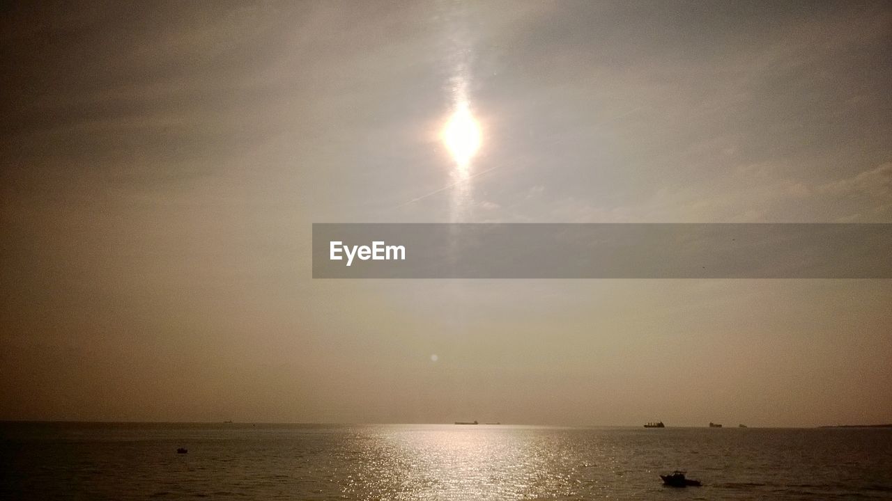 SEA AGAINST SKY DURING SUNSET