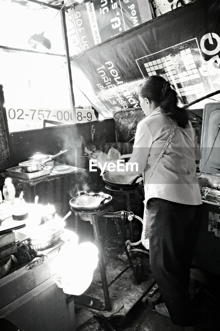 Woman working in kitchen