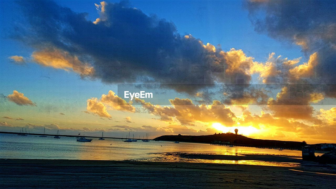 SUNSET OVER SEA