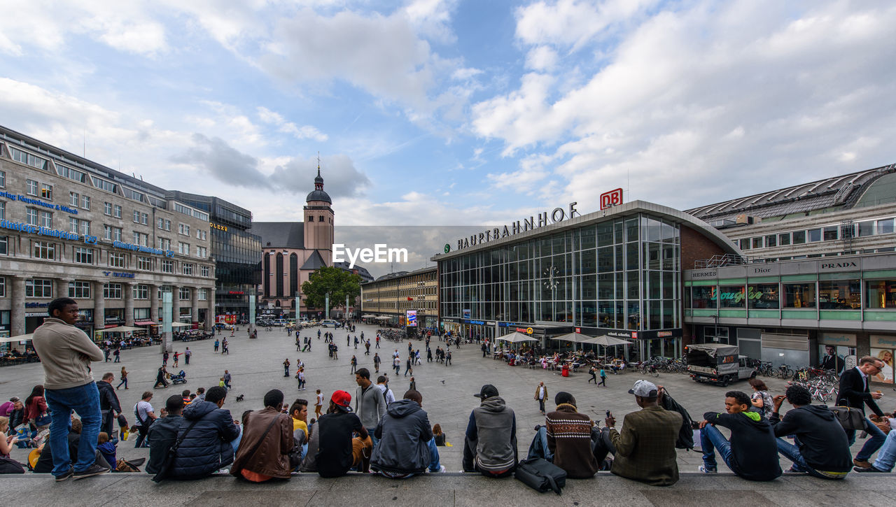 PEOPLE WALKING IN CITY