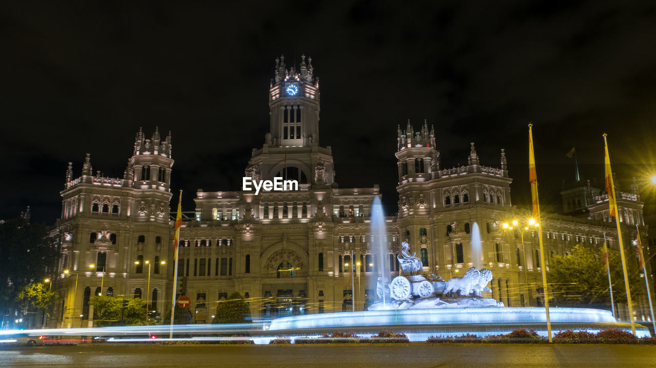 ILLUMINATED BUILDINGS AT NIGHT