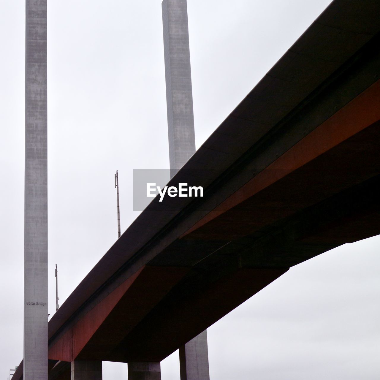 LOW ANGLE VIEW OF BRIDGE OVER AGAINST SKY