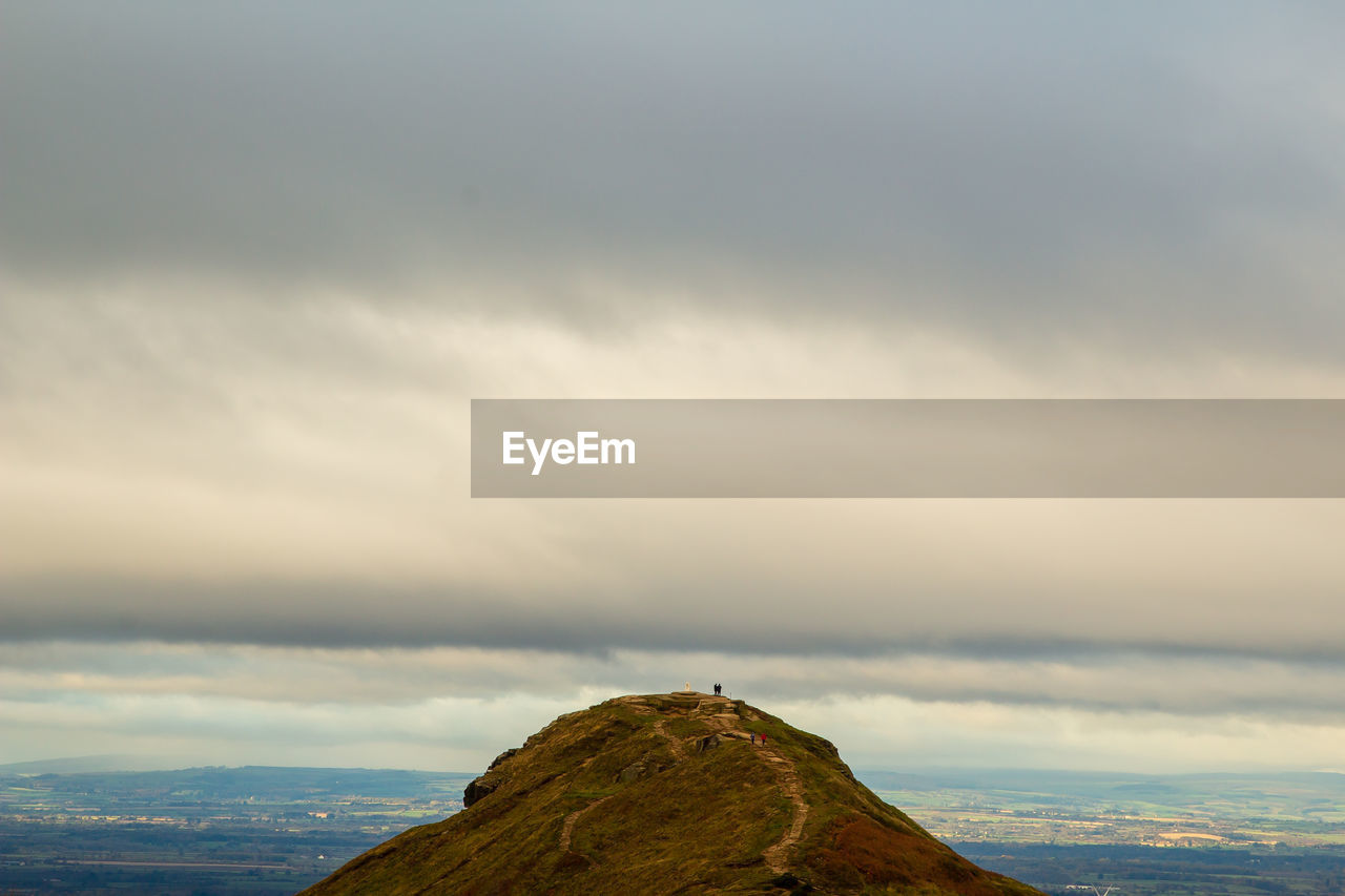 Man looking at sea against sky roseberry topping