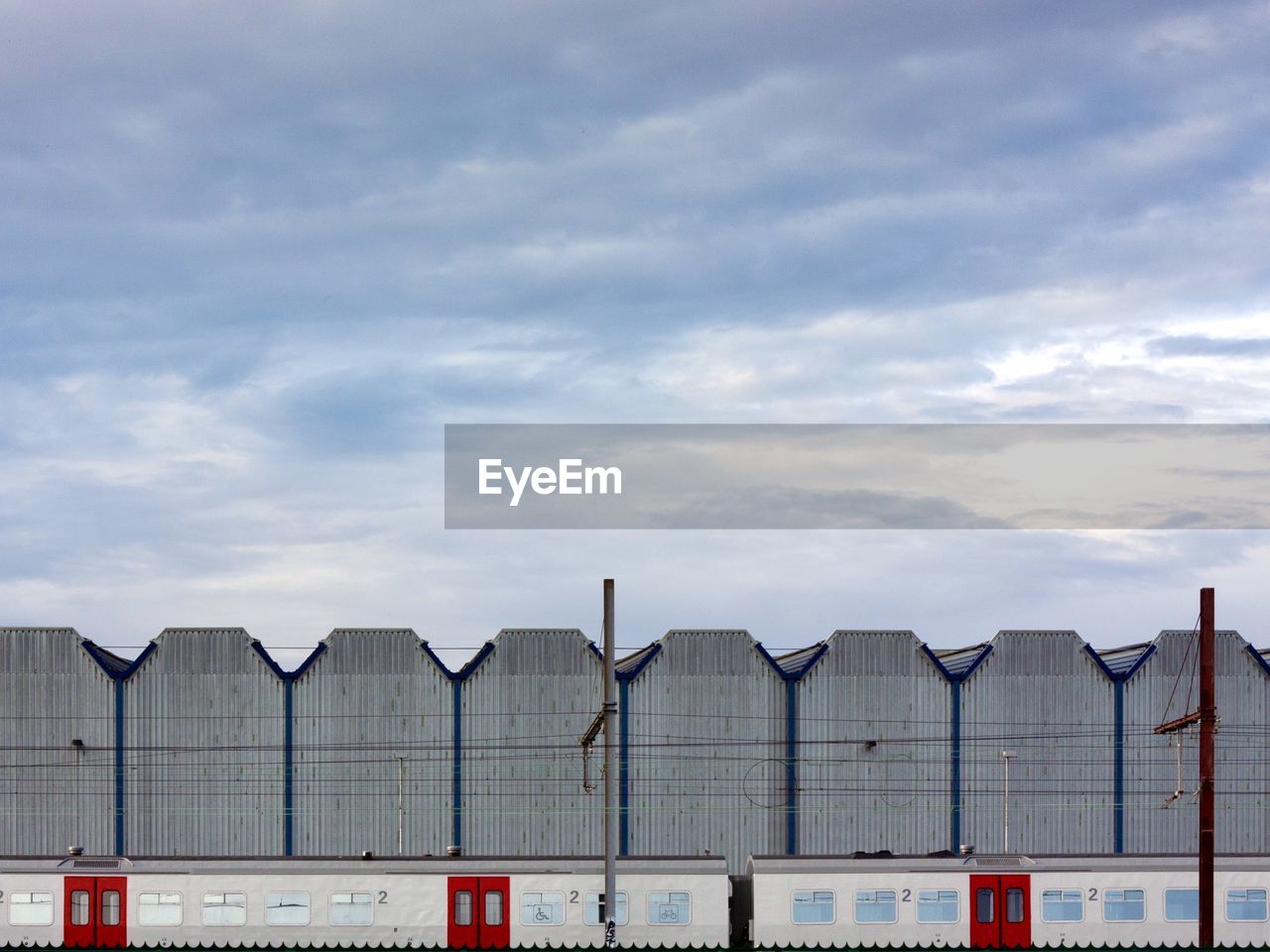 Panoramic shot of warehouse against sky