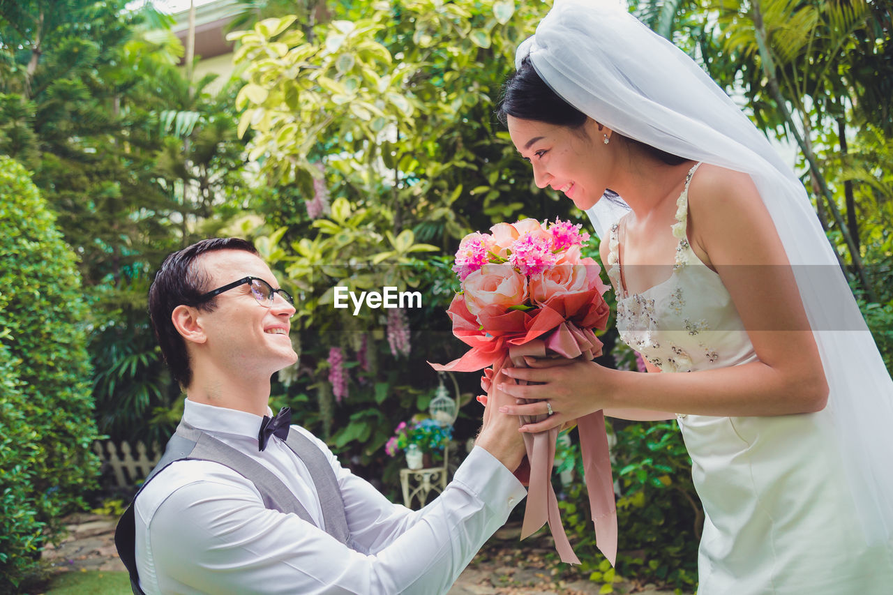 Close-up of couple standing outdoors