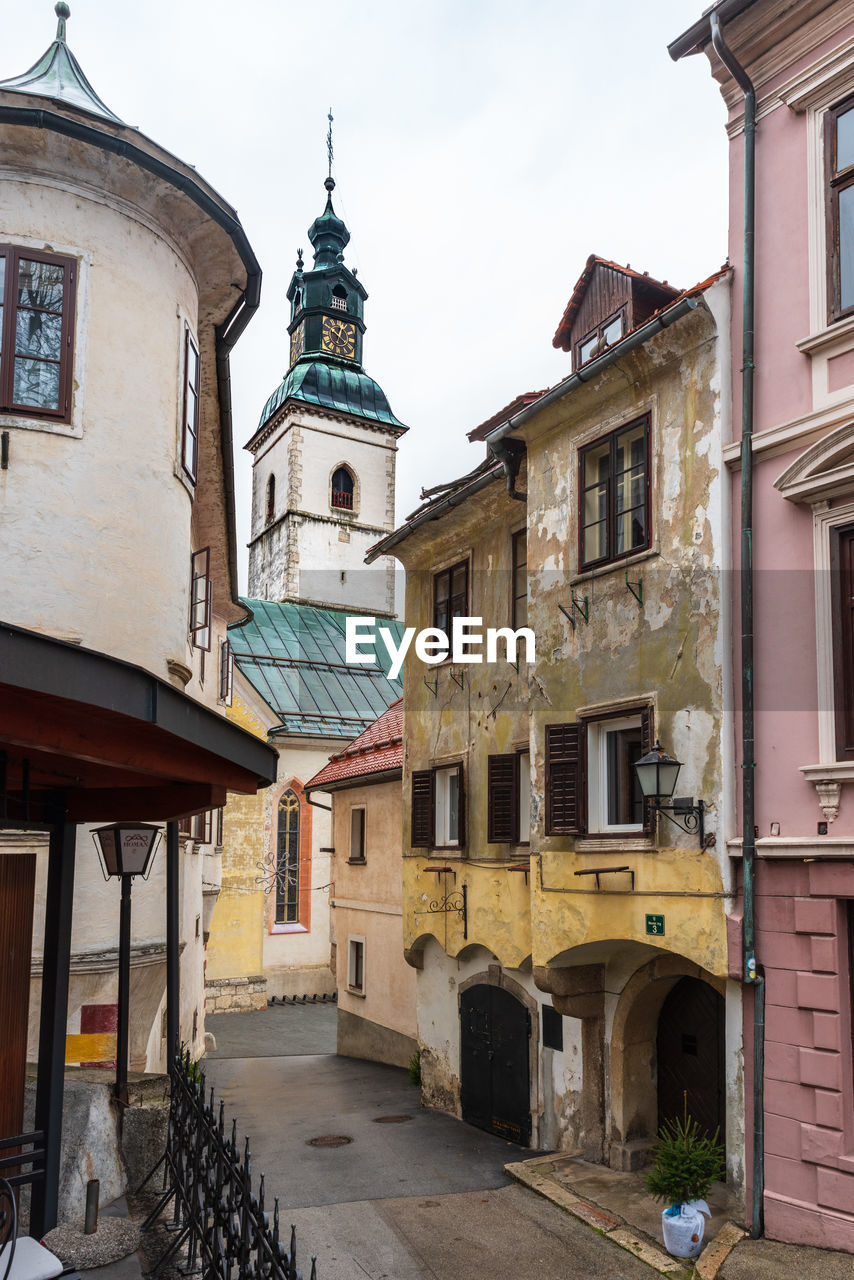 STREET AMIDST BUILDINGS IN TOWN