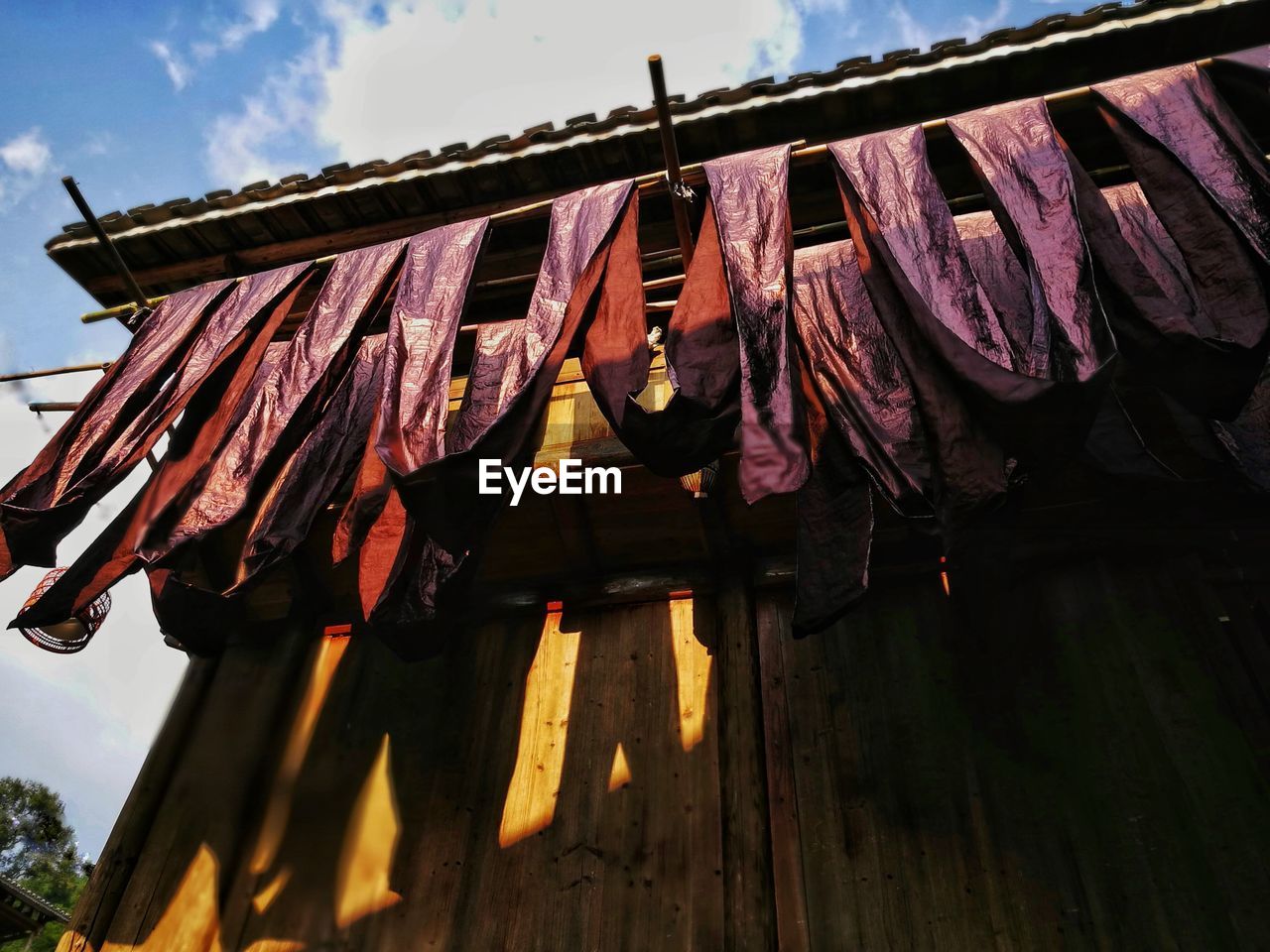 Low angle view of laundry hanging on rope