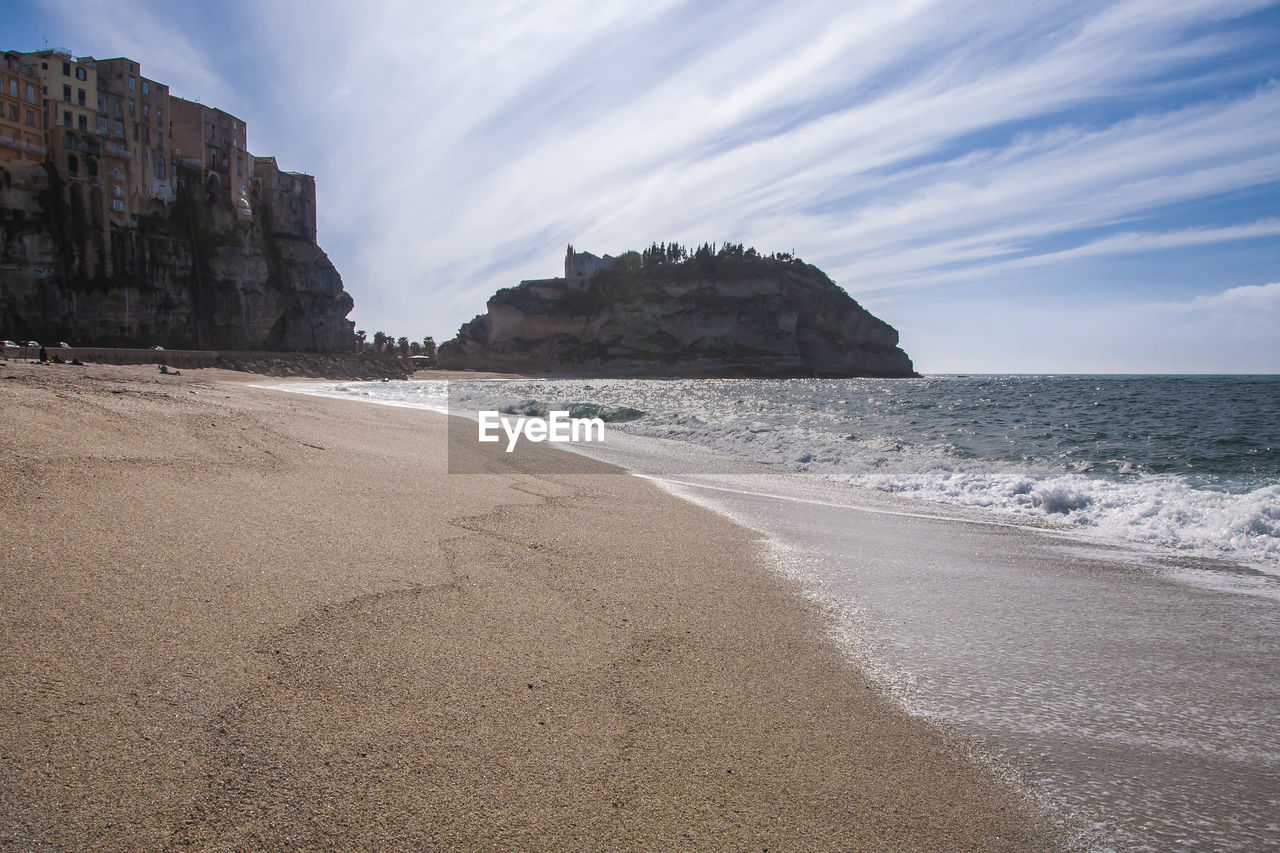 Scenic view of beach against sky