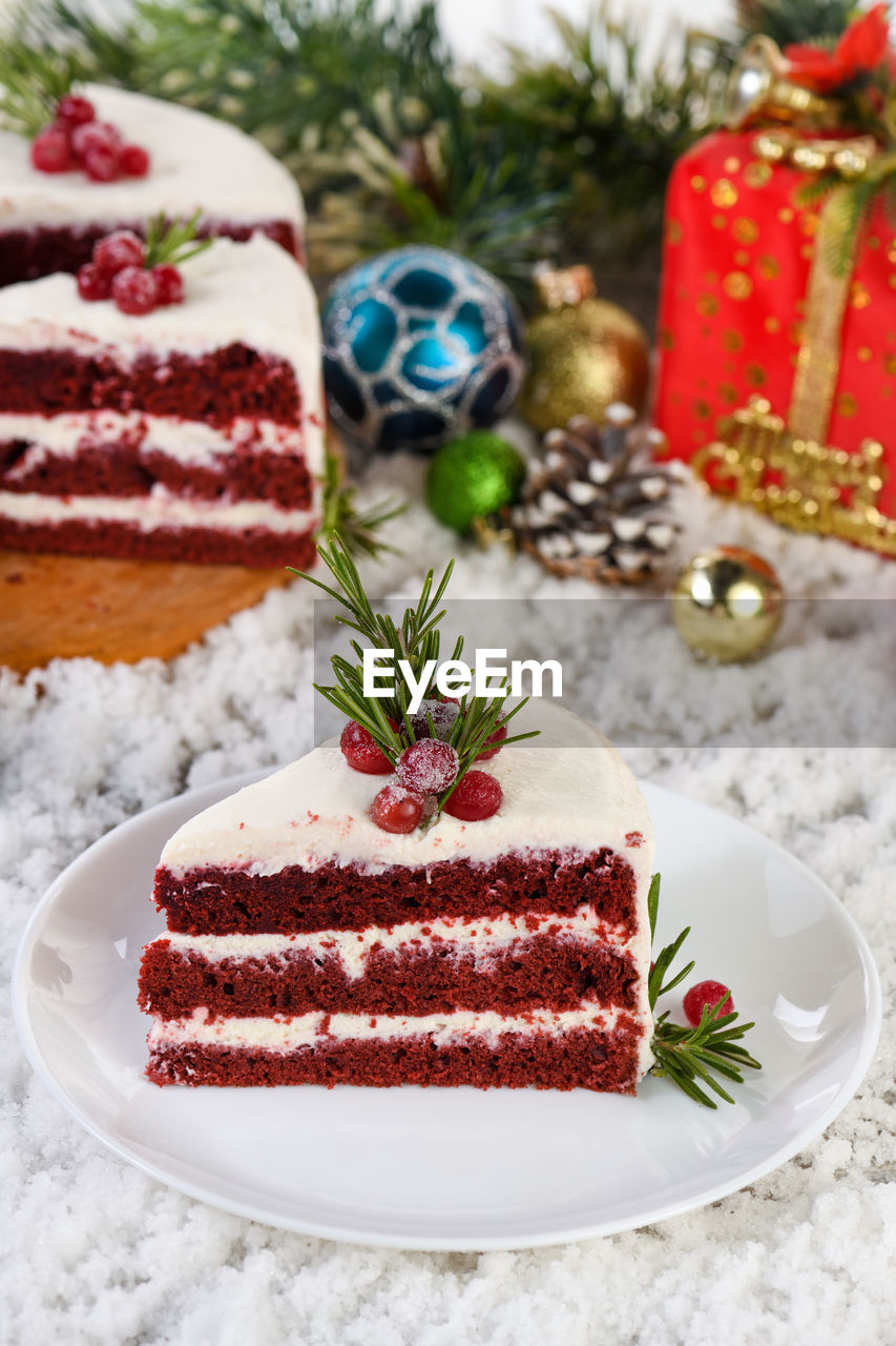 Red velvet cake is a traditional red chocolate cake topped with white buttercream 