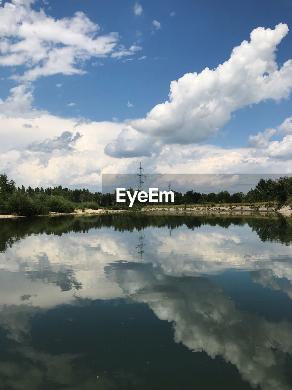 REFLECTION OF CLOUDS IN LAKE