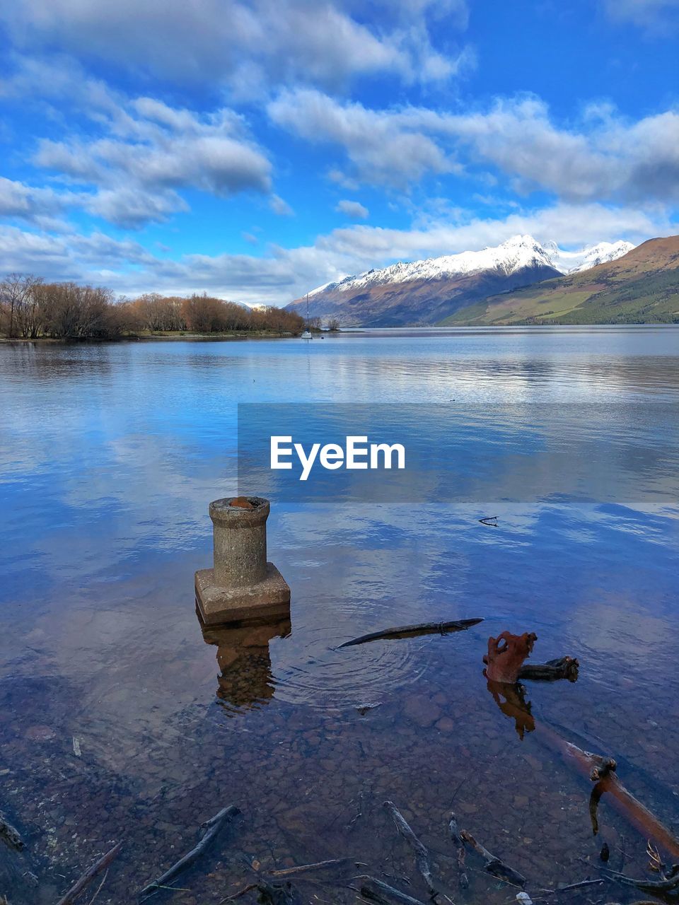 REFLECTION OF CLOUDS IN LAKE