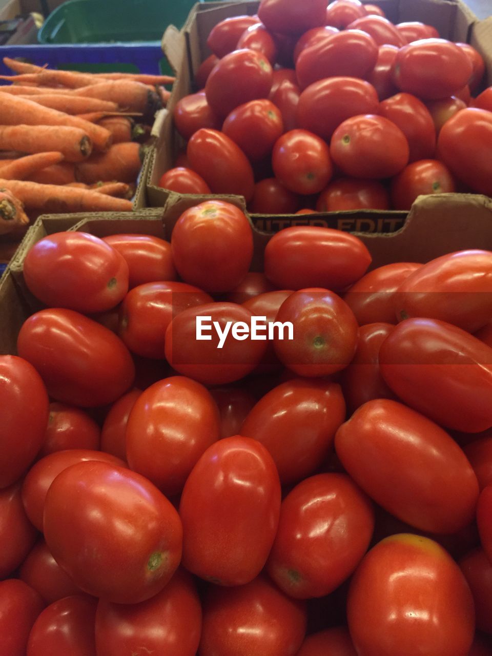 FULL FRAME SHOT OF TOMATOES FOR SALE AT MARKET