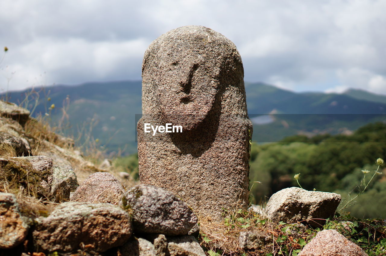 CLOSE-UP OF CEMETERY ON MOUNTAIN