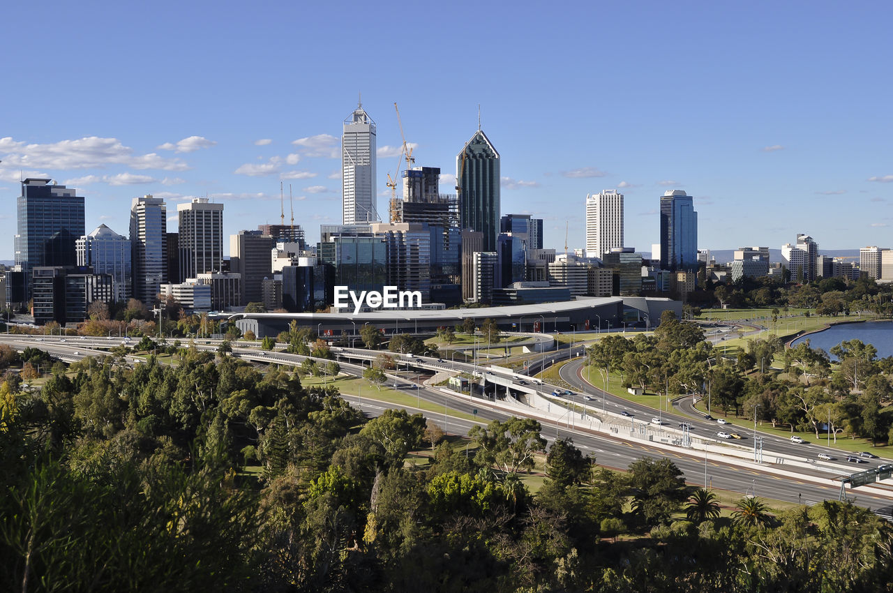 Panoramic view of city buildings against sky