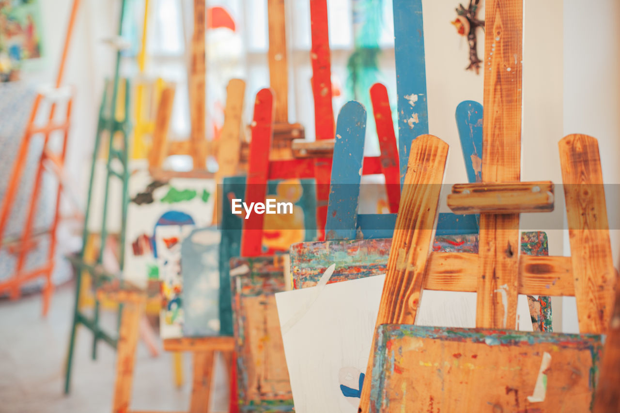 Close-up of easels in studio