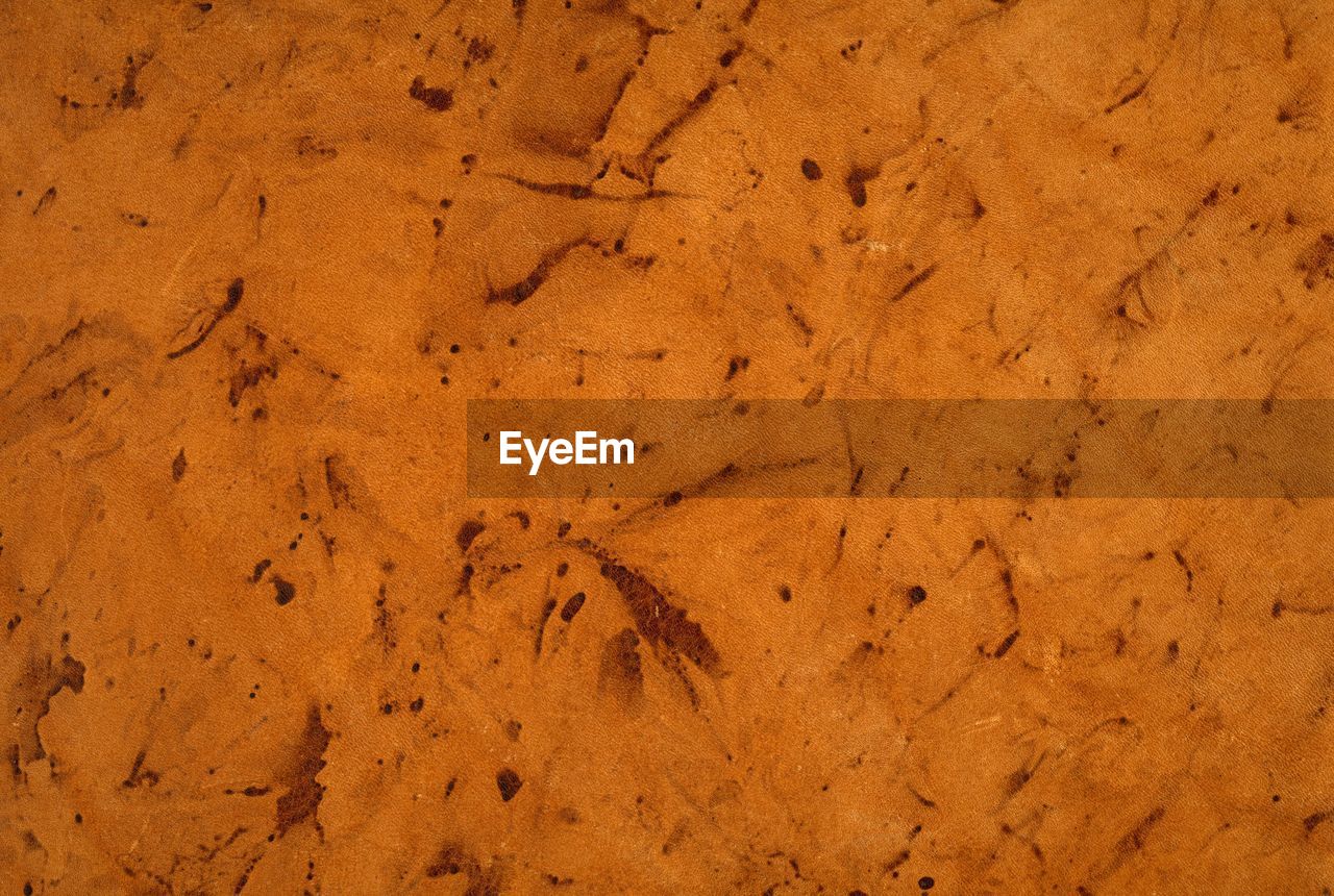 FULL FRAME SHOT OF OLD CRACKED LAND