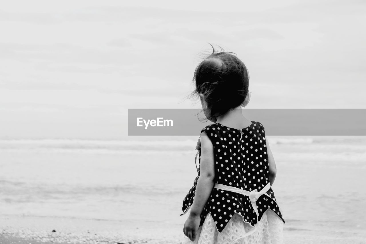 Little girl by the beach