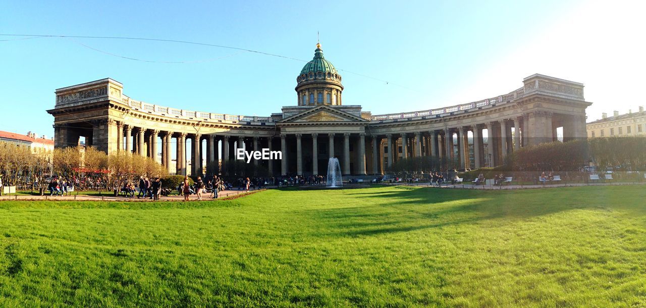 People at historic kazan cathedral against sky