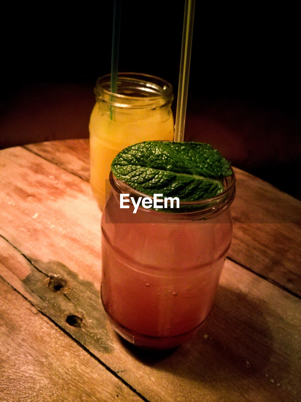 Drink in jars on wooden table