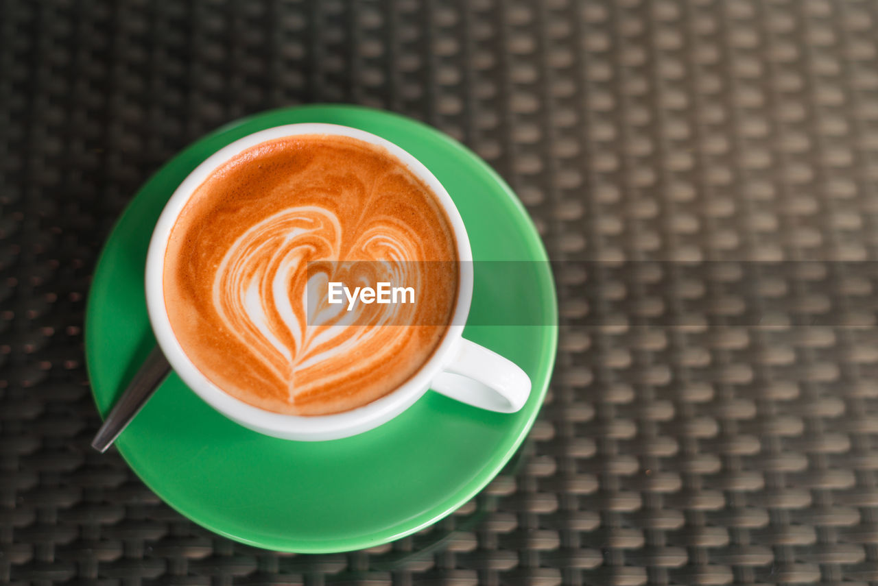 High angle view of cappuccino on table