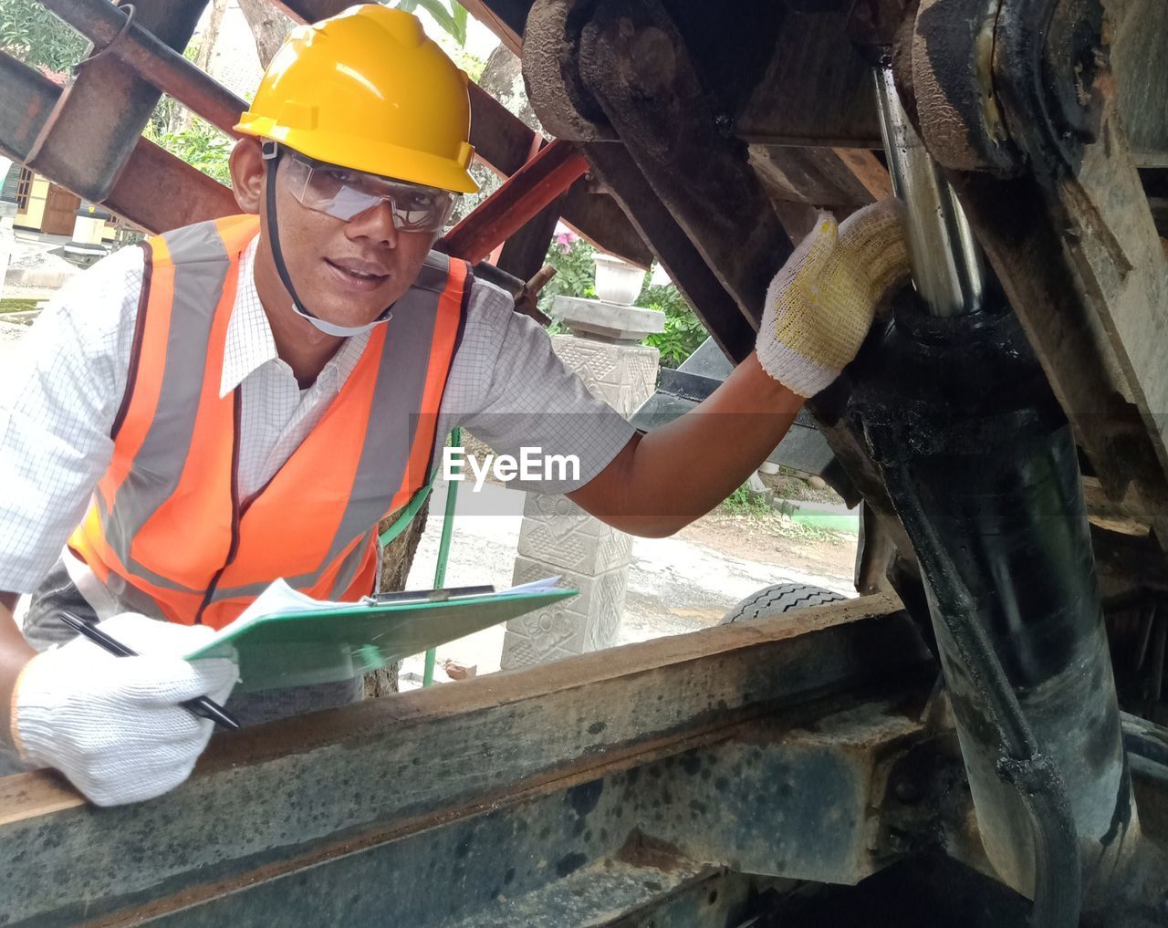 Engineer inspecting truck