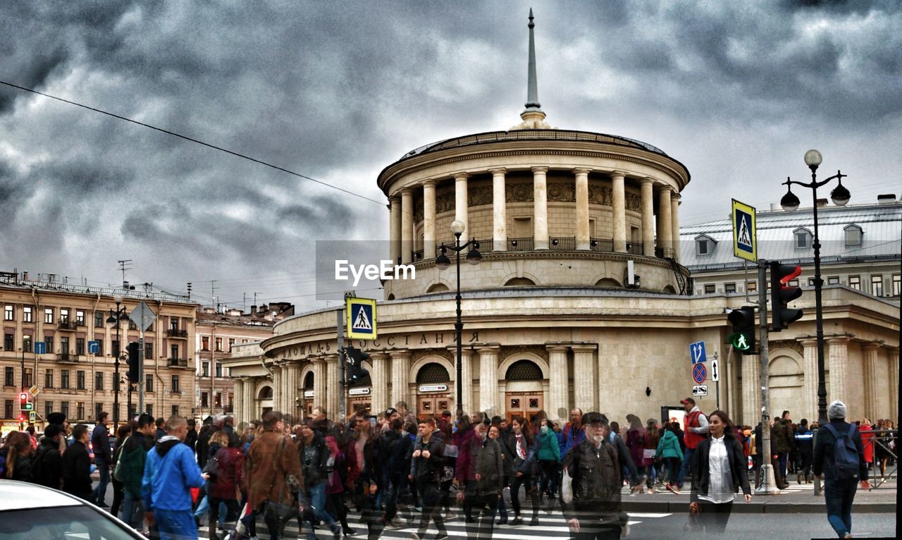 PEOPLE IN FRONT OF BUILDING