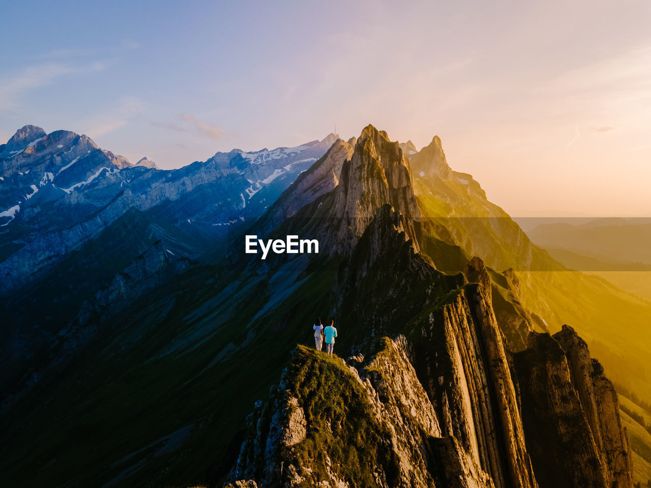 Panoramic view of mountain range against sky during sunset