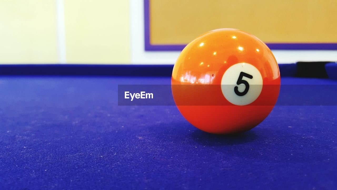 Close-up of ball on pool table