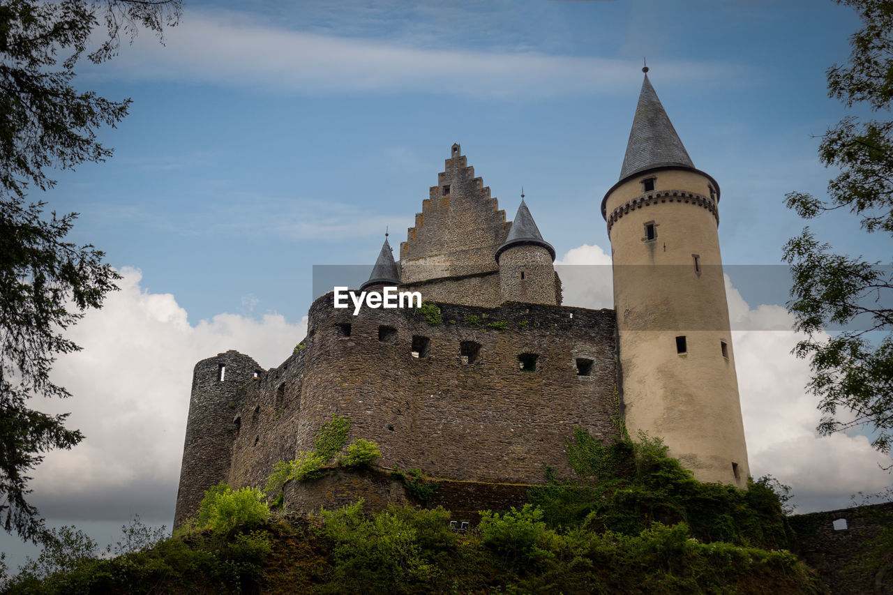 architecture, built structure, history, building, the past, building exterior, travel destinations, castle, sky, château, tree, nature, travel, tower, plant, religion, tourism, cloud, no people, low angle view, old, ancient, place of worship, outdoors, belief, day, spirituality