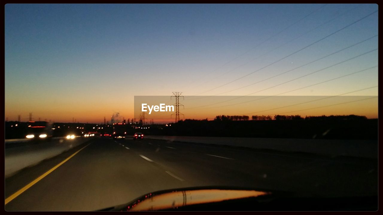 VIEW OF ROAD DURING SUNSET