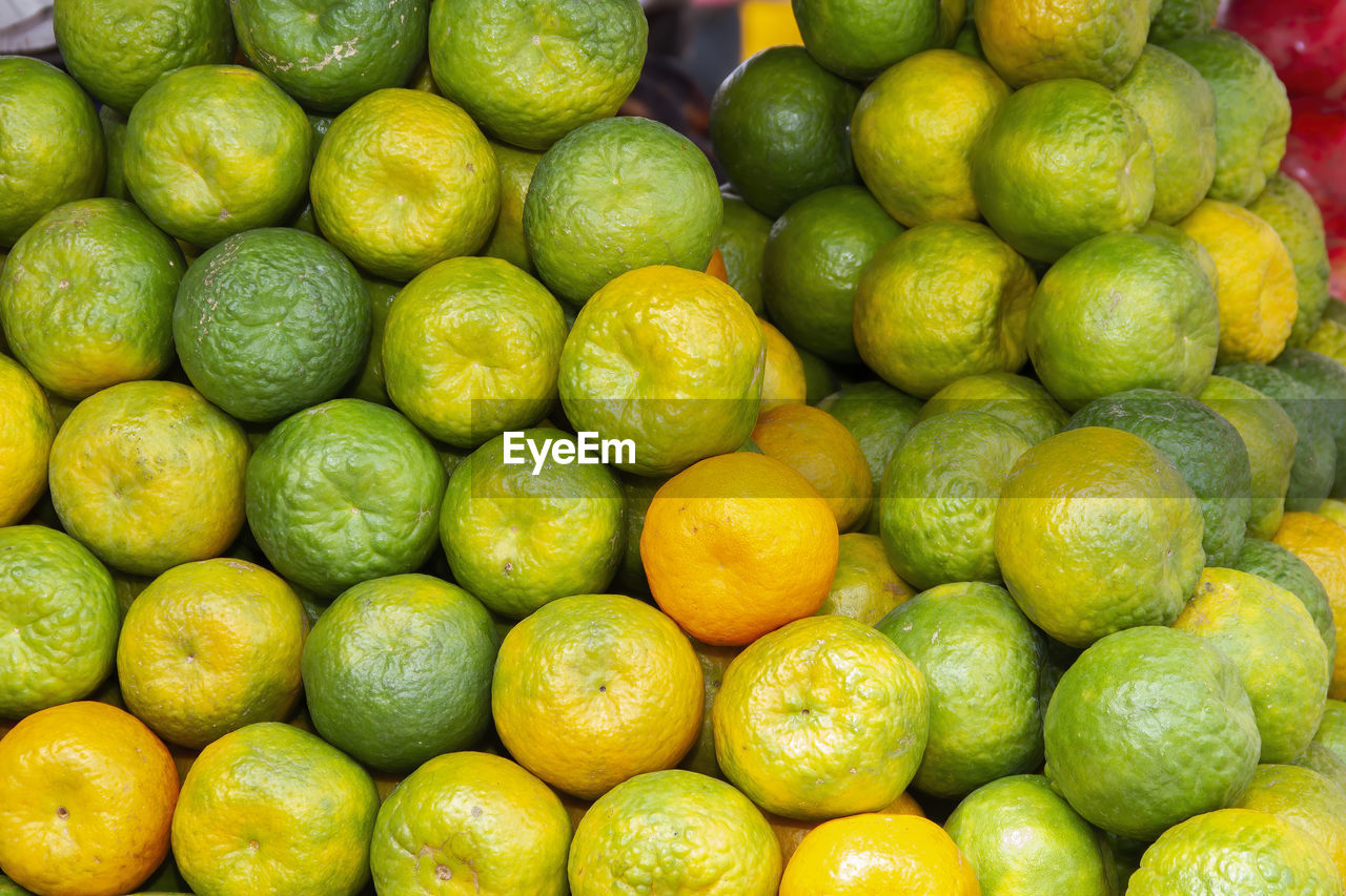 Fresh piles of mandarins