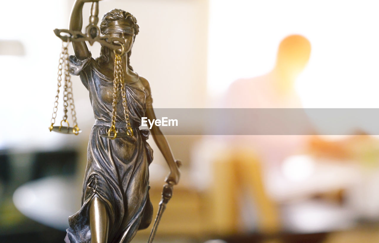 Close-up of lady justice in office