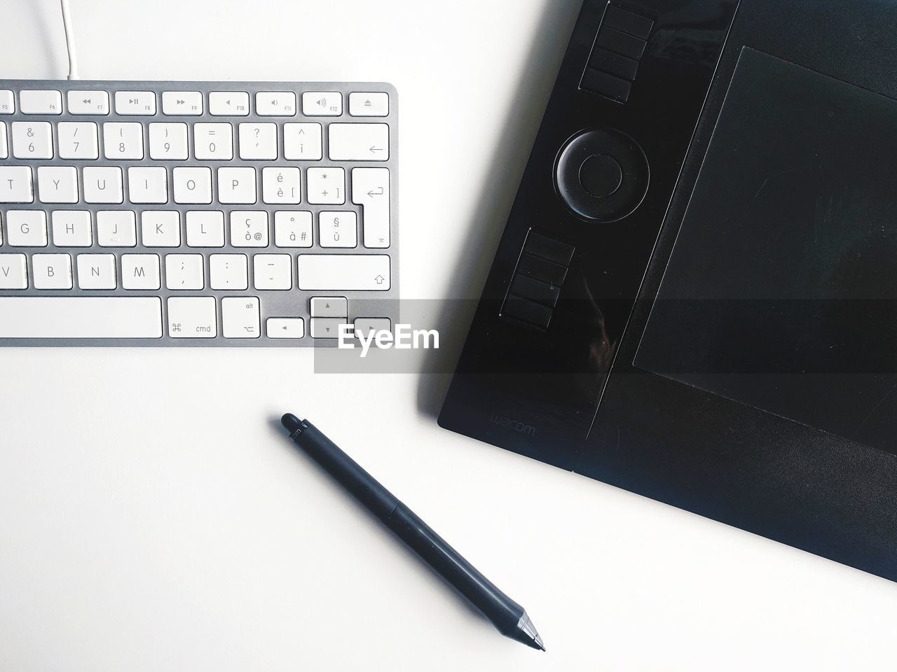 High angle view of computer keyboard over white background