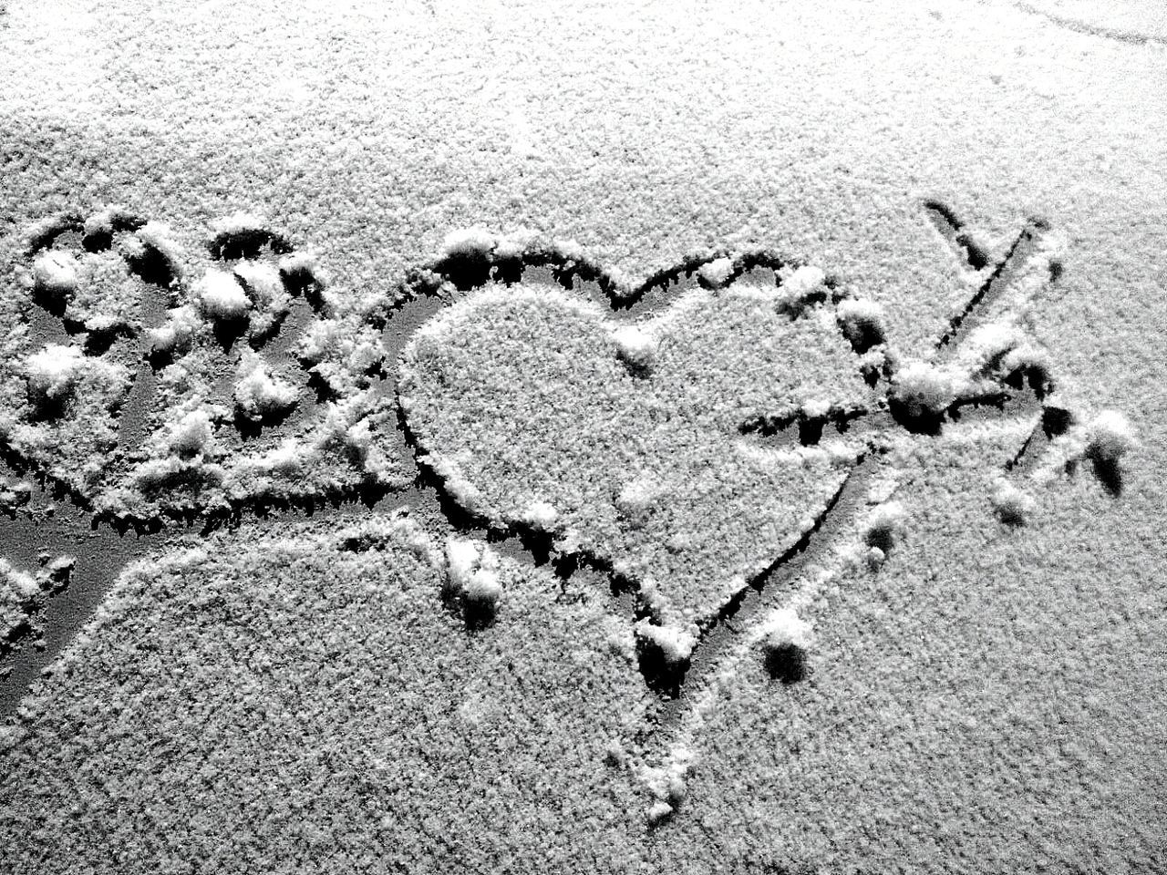 Close-up of footprints on sand