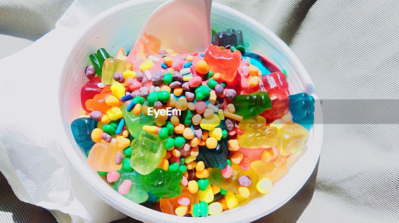 High angle view of candies in bowl