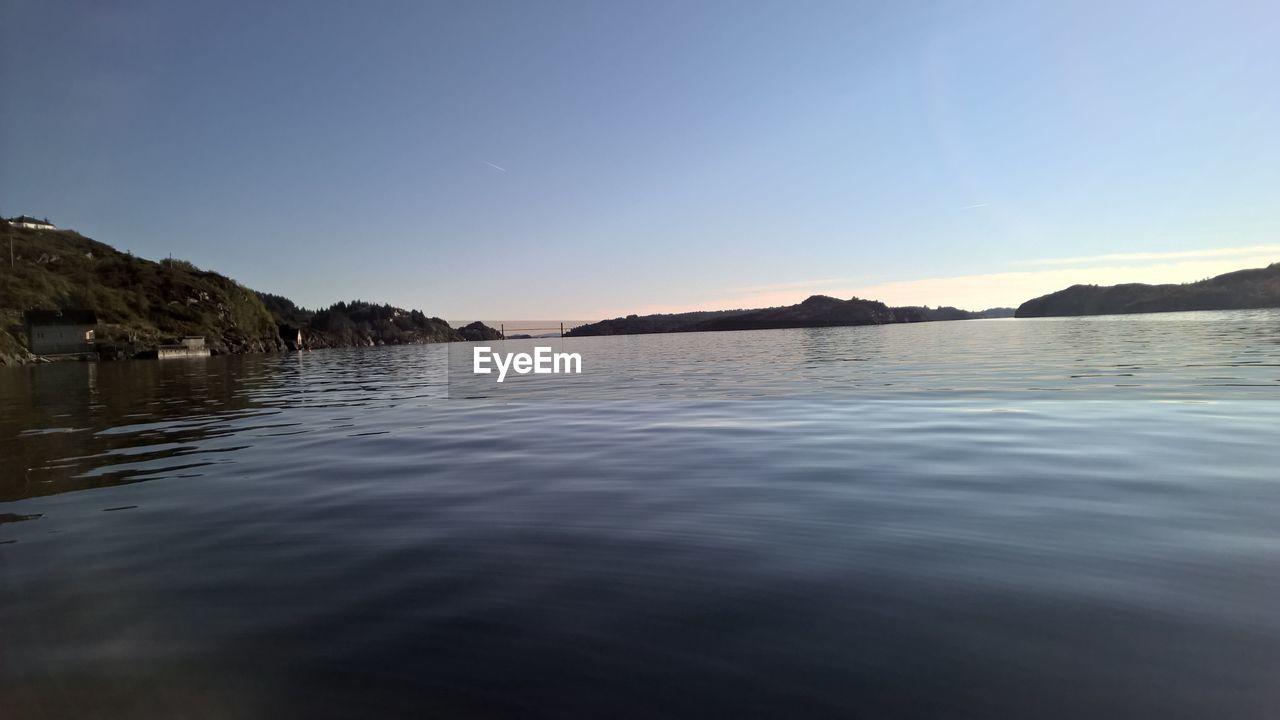 VIEW OF SEA AGAINST CLEAR BLUE SKY