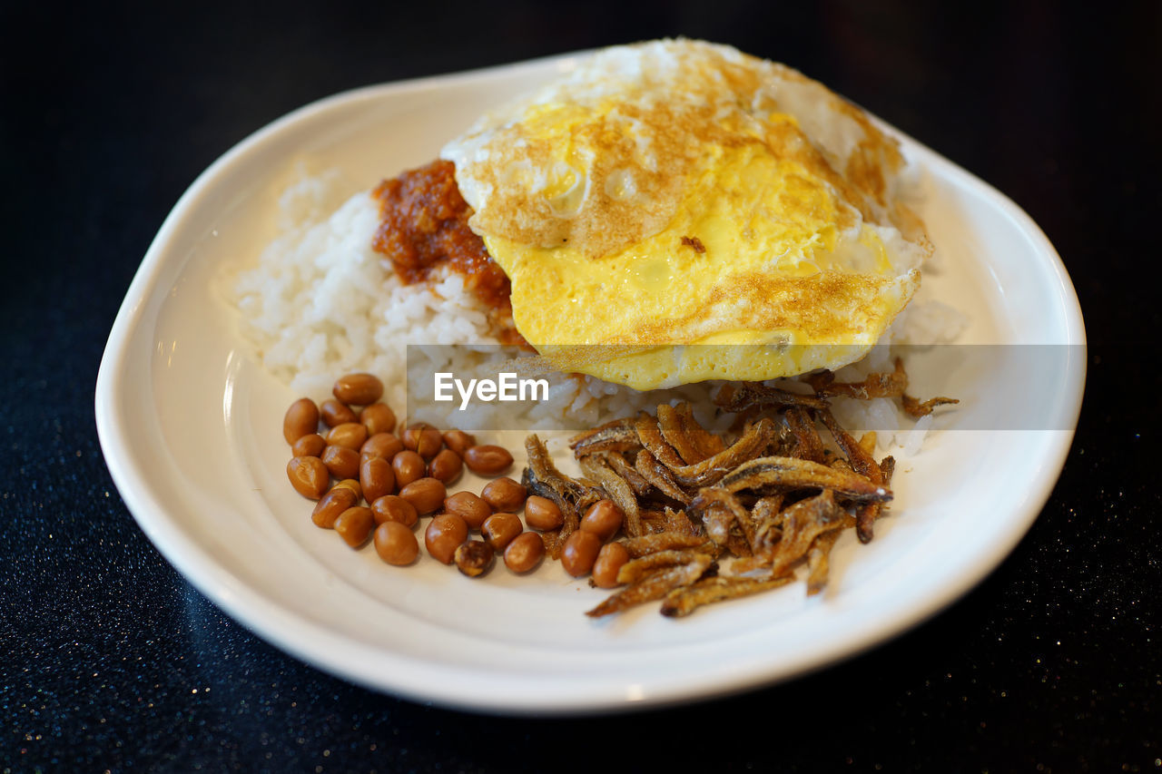 High angle view of meal served in plate on table