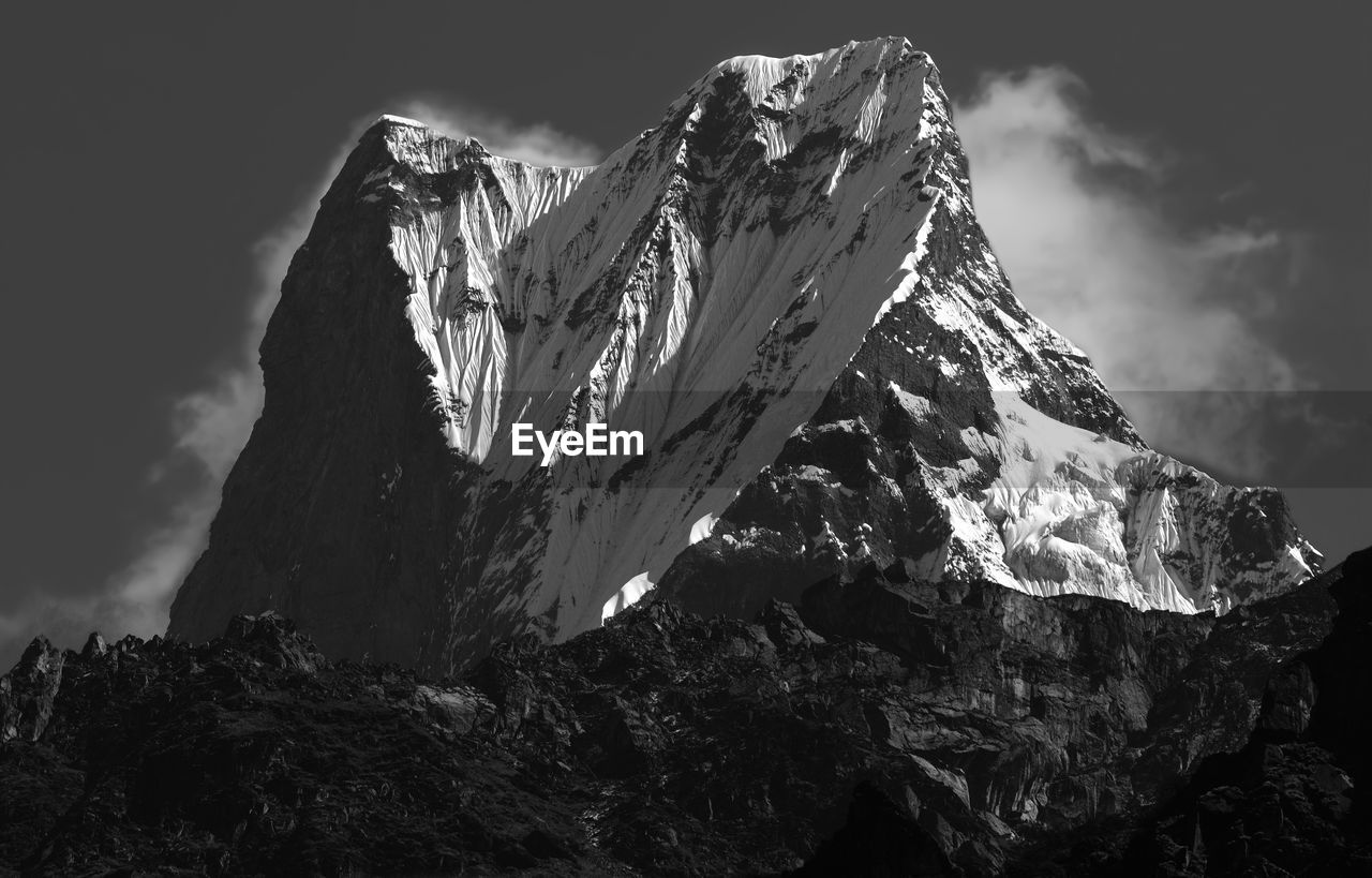 Low angle view of one of the most beautiful snowcapped mountain in himalaya against sky