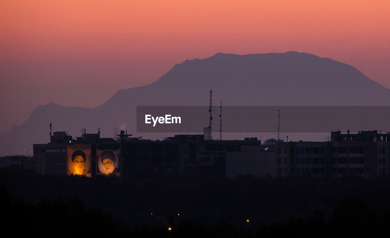 VIEW OF CITY AT SUNSET