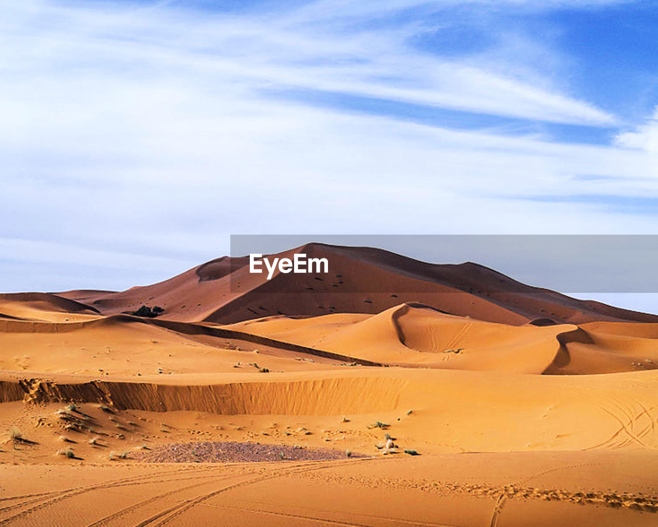 Scenic view of desert against sky