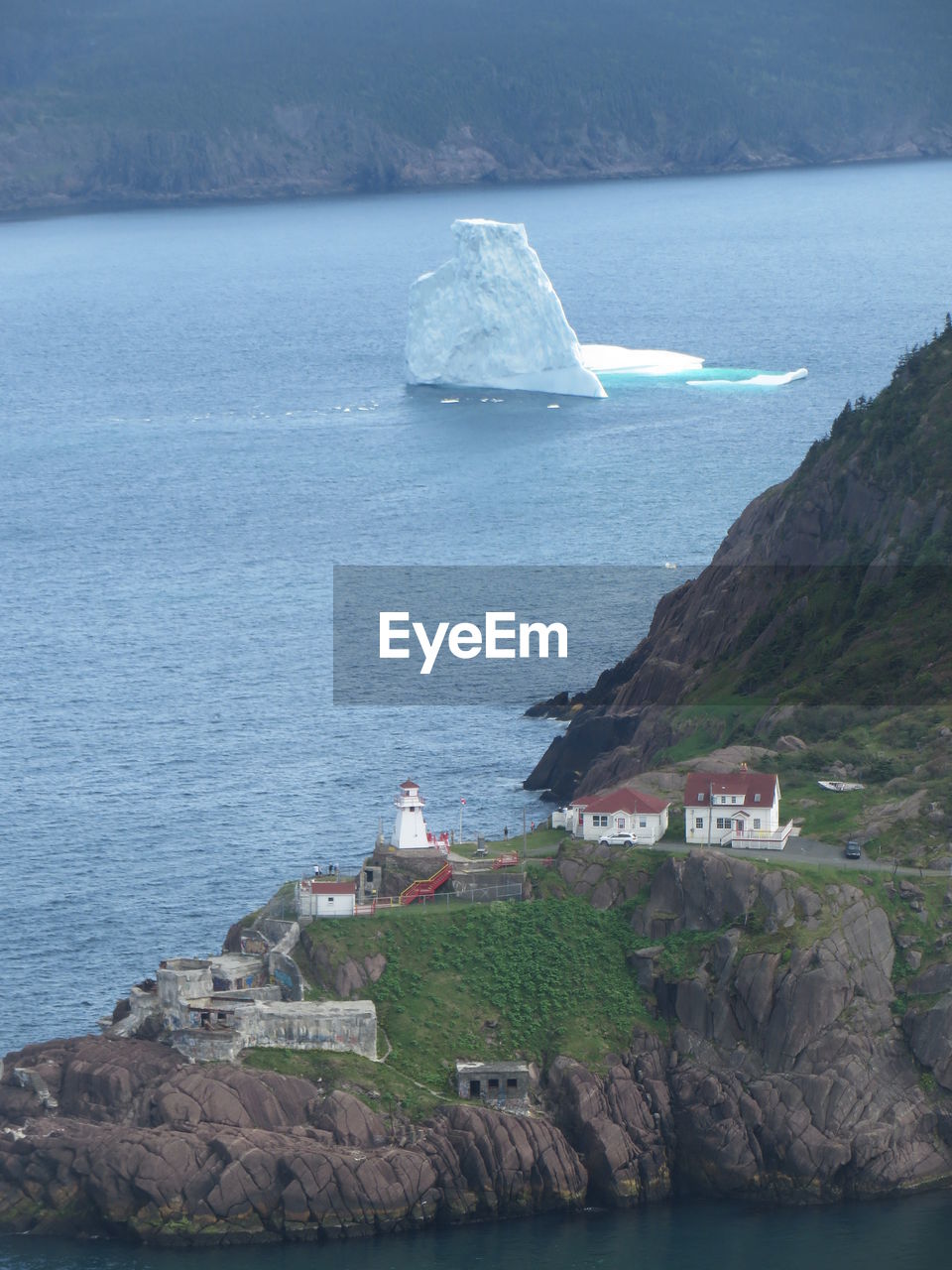 Scenic view of sea and buildings